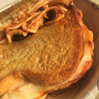 Burnt Crumbs - Spaghetti grilled cheese sandwich (ordered to go, so excuse the plate) - New American Near Me - Irvine, California Burnt Crumbs - Spaghetti grilled cheese sandwich (ordered to go, so excuse the plate) - New American Near Me - Irvine, California