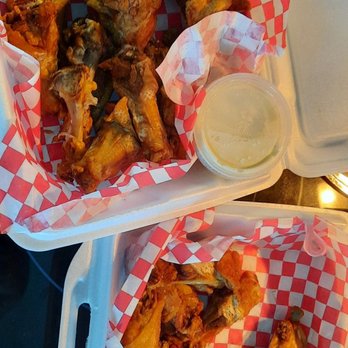Calhoon's 19 Hole Saloon - Takeout chicken wings (that we started chowing down on before the photo was taken)! - Chicken Wings Near Me - North Myrtle Beach, South Carolina Calhoon's 19 Hole Saloon - Takeout chicken wings (that we started chowing down on before the photo was taken)! - Chicken Wings Near Me - North Myrtle Beach, South Carolina
