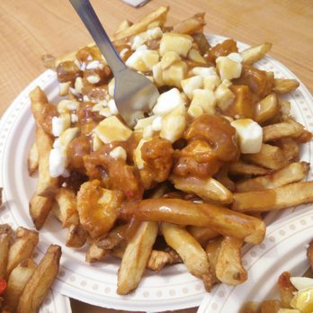 The Spudster - Butter chicken poutine - Food Stands Near Me - Little Britain, Ontario The Spudster - Butter chicken poutine - Food Stands Near Me - Little Britain, Ontario