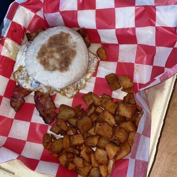 The Guzzle - breakfast sandwich with cold home fries with no seasoning on them - Sandwiches Near Me - Thousand Island Park, New York The Guzzle - breakfast sandwich with cold home fries with no seasoning on them - Sandwiches Near Me - Thousand Island Park, New York