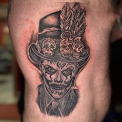 Eye Candy Tattoo West - Realism voodoo piece by artist Brian Webb