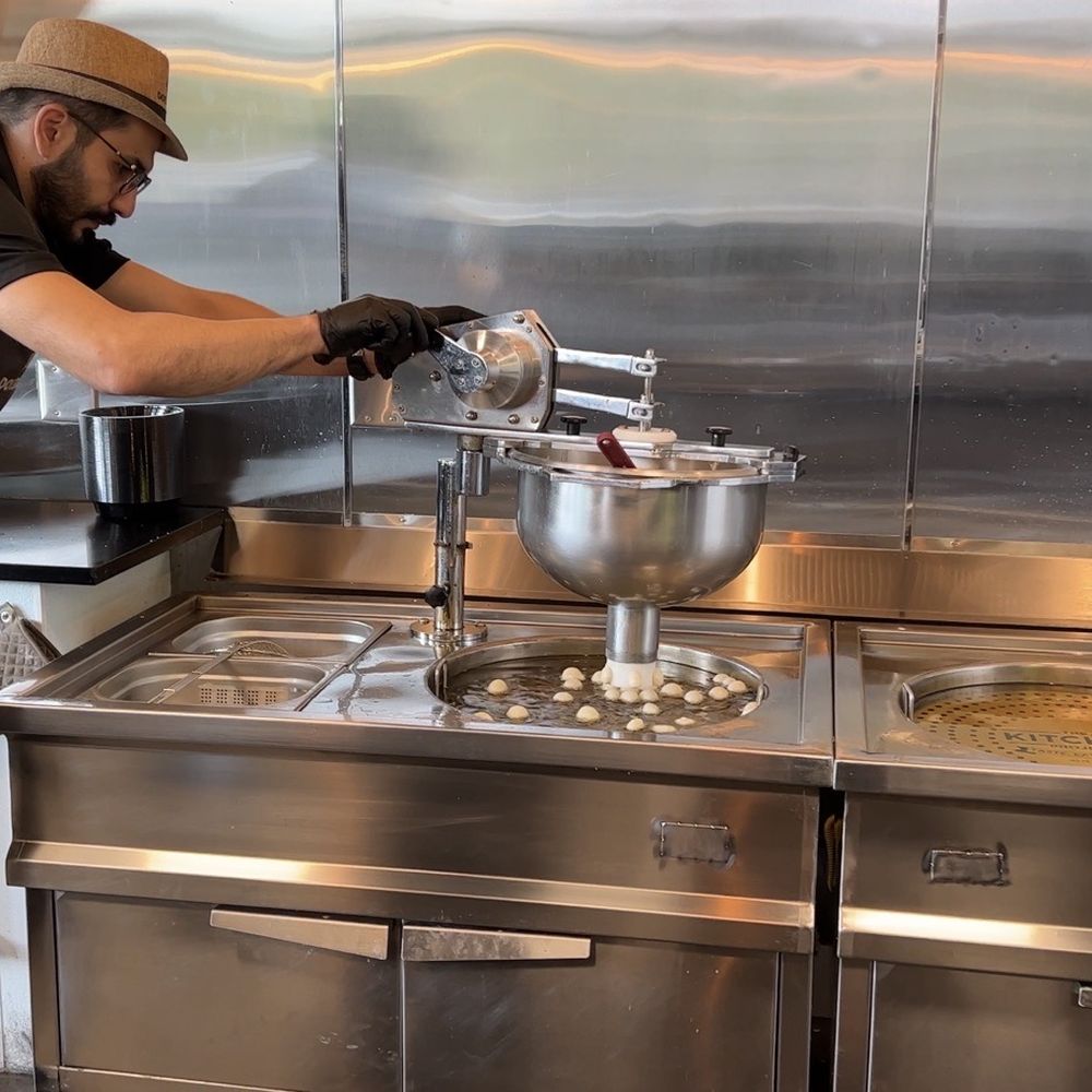 Dot Sugar - a man preparing food in a commercial kitchen - Desserts Near Me - Beaverton, Oregon Dot Sugar - a man preparing food in a commercial kitchen - Desserts Near Me - Beaverton, Oregon