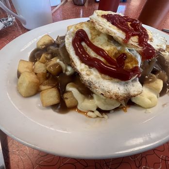 Lucy's Eastside Diner - Chorizo poutine with fried eggs - Diners Near Me - Vancouver, British Columbia Lucy's Eastside Diner - Chorizo poutine with fried eggs - Diners Near Me - Vancouver, British Columbia