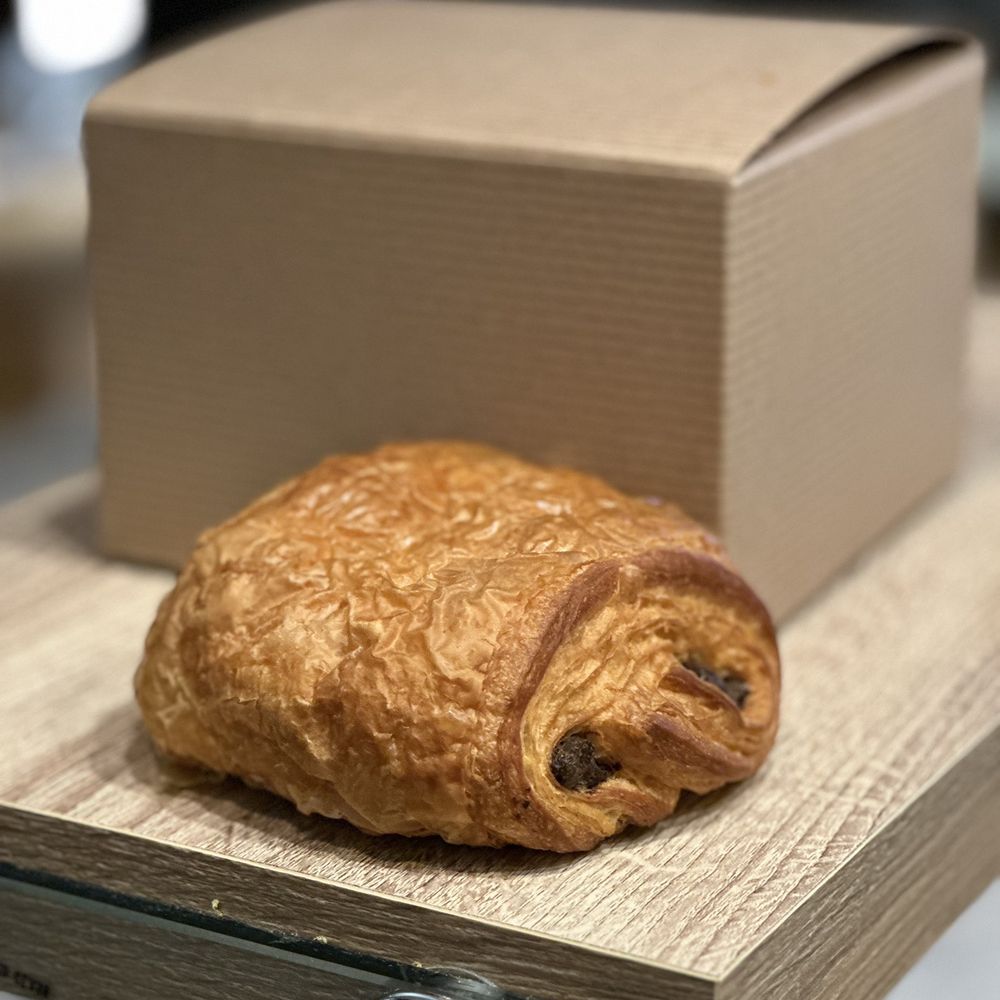 Tatte Bakery & Cafe | Assembly Row - Chocolate croissant - Breakfast & Brunch Near Me - Somerville, Massachusetts Tatte Bakery & Cafe | Assembly Row - Chocolate croissant - Breakfast & Brunch Near Me - Somerville, Massachusetts