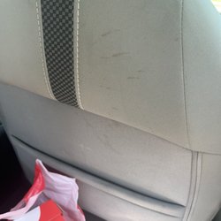 Thrifty Car Rental - Dirty and stained seat.