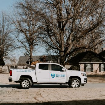 Superior Termite & Pest Control - a truck parked in front of a house - Pest Control Near Me - Broken Arrow, Oklahoma