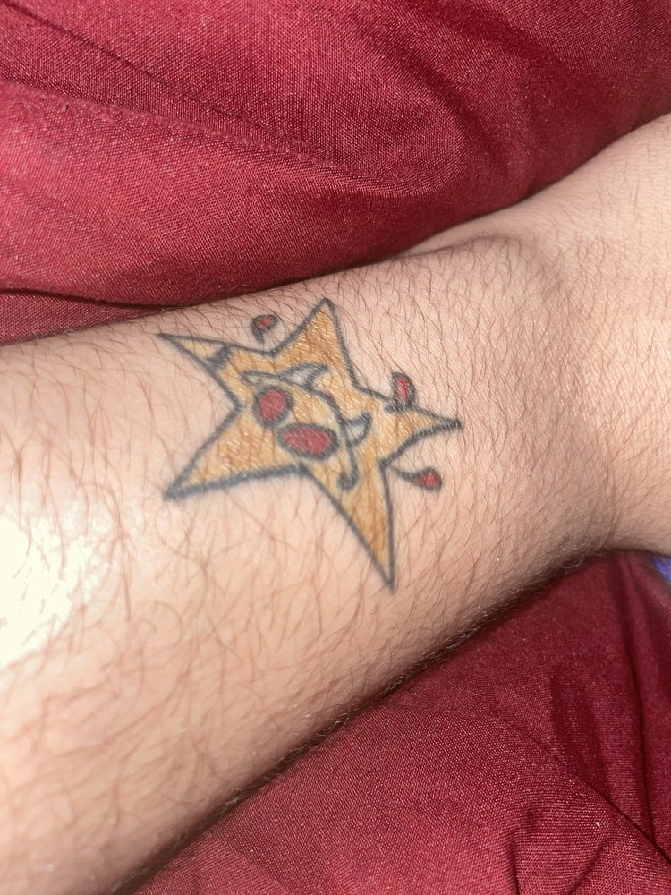 Iktomi Tattoo Logo