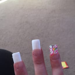 Lifting and white nail polish that she said wouldnt chip off right away, this isn't even 48 hrs after having them done Lifting and white nail polish that she said wouldnt chip off right away, this isn't even 48 hrs after having them done