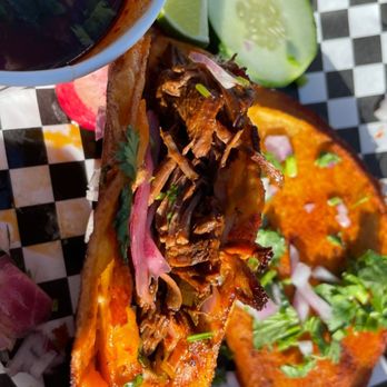Cielito Lindo - The inside of a birria taco. This photo does it no justice. There is SO MUCH MEAT in there! - Mexican Near Me - San Francisco, California
