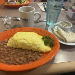 Dorado omelette with pinto beans.