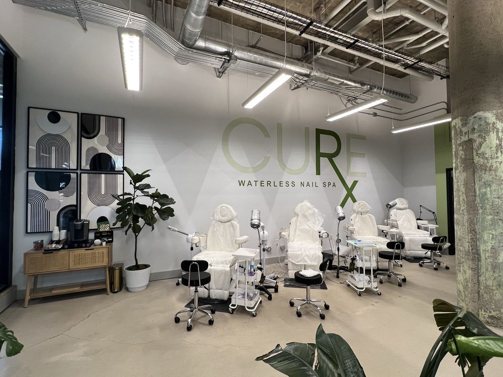 Cure Waterless Nail Spa Logo