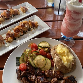 Riptides Raw Bar & Grill - This was amazing. Not your typical steak flavor. Stuffed shrimp and flavorful veggies. - Seafood Near Me - Ormond Beach, Florida Riptides Raw Bar & Grill - This was amazing. Not your typical steak flavor. Stuffed shrimp and flavorful veggies. - Seafood Near Me - Ormond Beach, Florida