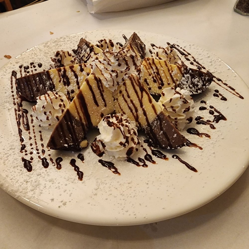 Tartufo an Italian dessert of gelato that originated in Pizzo, Calabria.