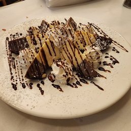 Tartufo an Italian dessert of gelato that originated in Pizzo, Calabria. Tartufo an Italian dessert of gelato that originated in Pizzo, Calabria.