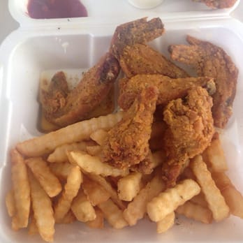 Panda New York Style - Lemon pepper wings with fries (it smelled so good that I started eating before I took a picture lol) - Chinese Near Me - Lawrenceville, Georgia