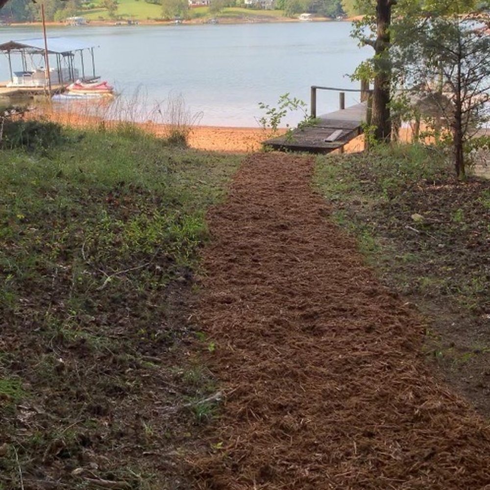 TreeMax Expert Tree Service LLC - A restored path was nicely prepared with cypress mulch down to the dock - Tree Services Near Me - Gainesville, Georgia TreeMax Expert Tree Service LLC - A restored path was nicely prepared with cypress mulch down to the dock - Tree Services Near Me - Gainesville, Georgia