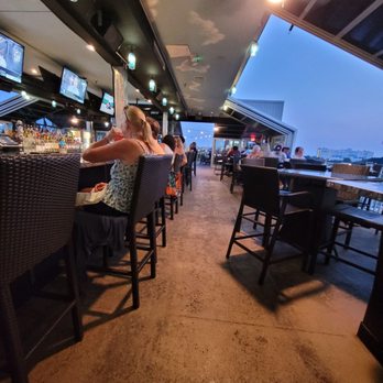 Skye Bar & Grille - people sitting at the bar - Bars Near Me - Ocean City, Maryland Skye Bar & Grille - people sitting at the bar - Bars Near Me - Ocean City, Maryland