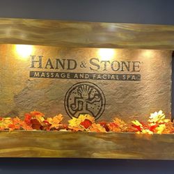 Hand & Stone Massage and Facial Spa - Stone sign