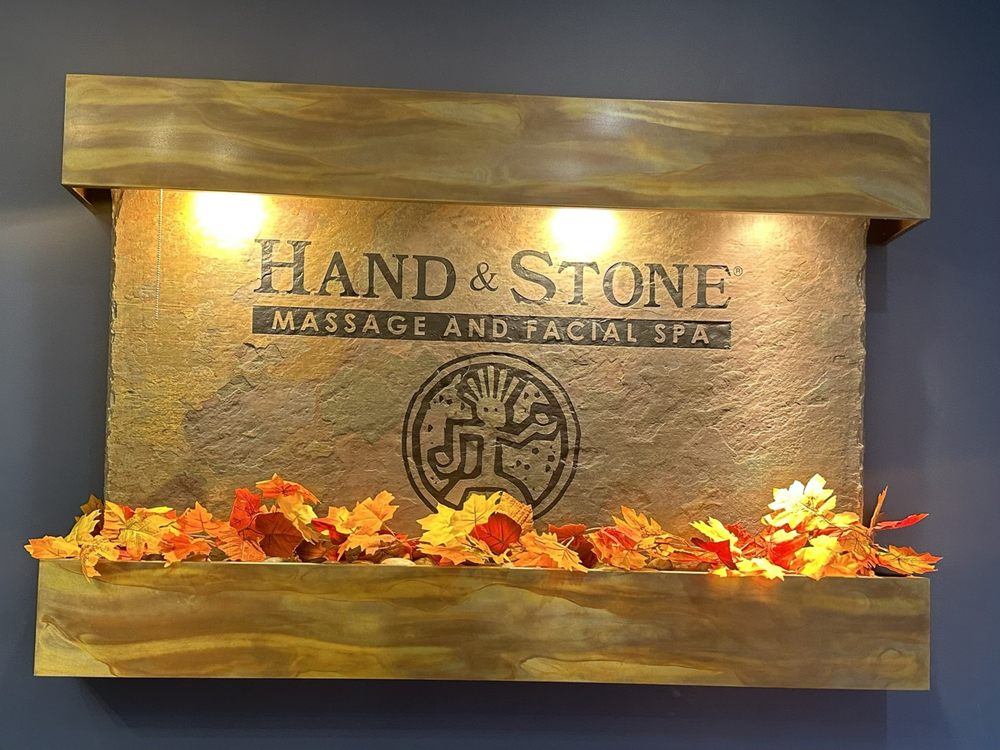 Hand & Stone Massage and Facial Spa Logo