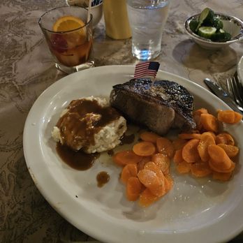 Ted's Montana Grill - Bison New York steak with garlic mashed potatoes and buttered carrots - Burgers Near Me - Peachtree Corners, Georgia Ted's Montana Grill - Bison New York steak with garlic mashed potatoes and buttered carrots - Burgers Near Me - Peachtree Corners, Georgia