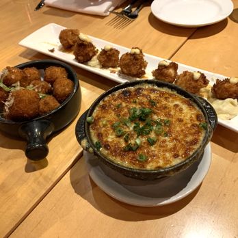 Central Michel Richard - A variety of menu items including Chicken Nuggets, Onion Soup, and Risotto Croquettes. - New American Near Me - Washington, DC, District of Columbia