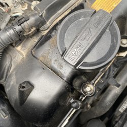 Edmonton BMW - Burn oil running down the front side where they fill it up