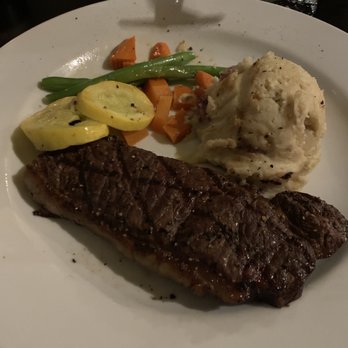 Remingtons of Niagara - NY Strip Steak with garlic mash and veggies - Steakhouses Near Me - Niagara Falls, Ontario Remingtons of Niagara - NY Strip Steak with garlic mash and veggies - Steakhouses Near Me - Niagara Falls, Ontario