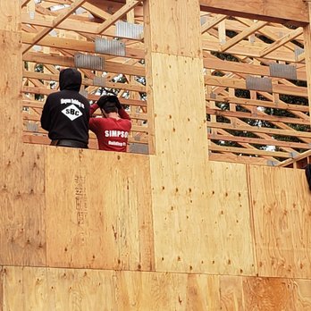 Simpson Building Company - two men working on a house - General Contractors Near Me - Eureka, California