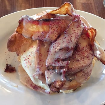 Ten Mile House - The Dude (sausage, fried eggs, maple glazed bacon, and cinnamon roll) - American Near Me - Evanston, Illinois Ten Mile House - The Dude (sausage, fried eggs, maple glazed bacon, and cinnamon roll) - American Near Me - Evanston, Illinois