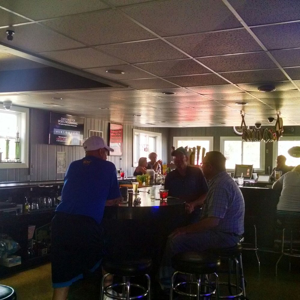 Hammer Inn - a group of people sitting at a bar - Bars Near Me - Green Bay, Wisconsin