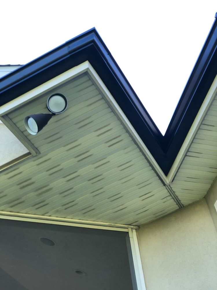 Slide of Triple GGG's Seamless Gutters