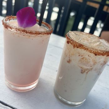 Backyard on Broadway - Left is a strawberry margarita and the right is the Whorechata (horchata and whiskey) - Bars Near Me - San Antonio, Texas