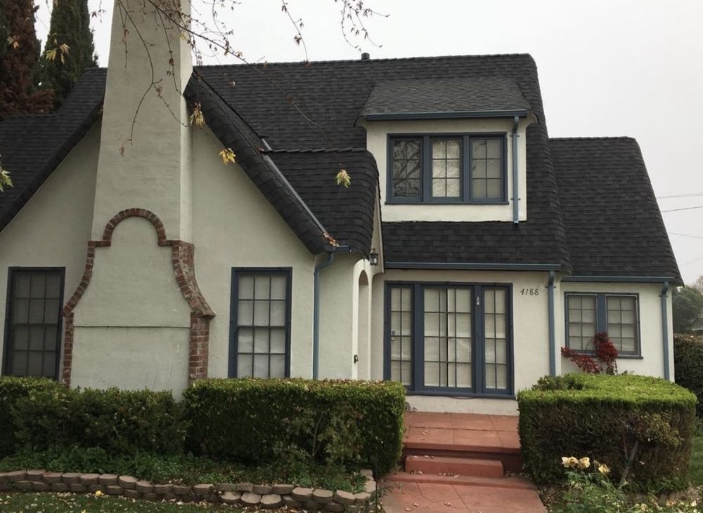 Slide of Exclusively Roofing