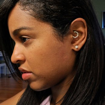Exotix Studios - Daith piercing, approximately 8 months in. Pieced by Jessie in July 2017 and BVLA Tiffany installed by Six in March 2018 - Piercing Near Me - Toronto, Ontario