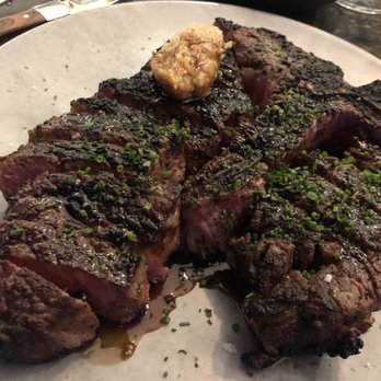 Garrison - 28oz Prime Porterhouse served with roasted garlic and bordelaise. Porterhouse Perfection! // @thesoutherndish - New American Near Me - Austin, Texas Garrison - 28oz Prime Porterhouse served with roasted garlic and bordelaise. Porterhouse Perfection! // @thesoutherndish - New American Near Me - Austin, Texas