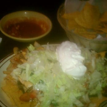 El Toro - a plate of mexican food with tortillas and guacamole - Bars Near Me - Dayton, Ohio