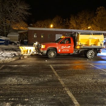 Brick Hill Property Services - a red truck parked in a parking lot - Landscaping Near Me Brick Hill Property Services - a red truck parked in a parking lot - Landscaping Near Me