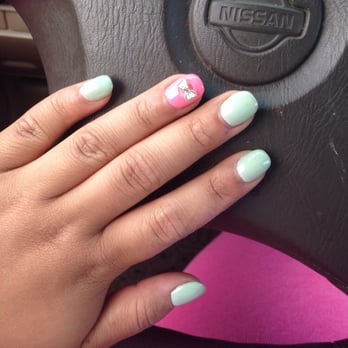 TD Nails - kept it simple and did a mint green with pink accent and jewel. Love the job that I did. I requested rounded and they delivered. - Nail Salons Near Me - Mill Creek, Washington TD Nails - kept it simple and did a mint green with pink accent and jewel. Love the job that I did. I requested rounded and they delivered. - Nail Salons Near Me - Mill Creek, Washington