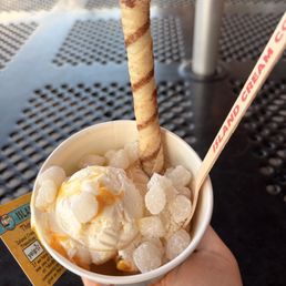 Single split scoop with lillikoi cheesecake and macadamia nut with mochi Single split scoop with lillikoi cheesecake and macadamia nut with mochi