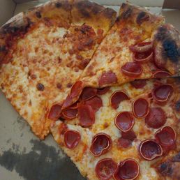 Paper thin pizza and raw cheese. Like, what?? Paper thin pizza and raw cheese. Like, what??
