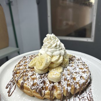 The Nook - a waffle topped with bananas and whipped cream - Breakfast & Brunch Near Me - Lewistown, Pennsylvania