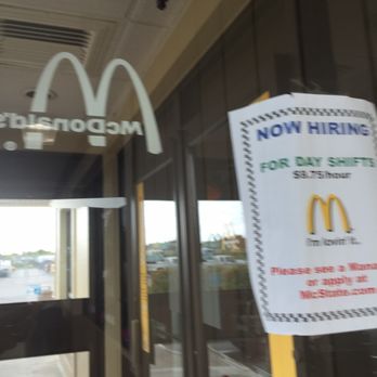 McDonald's - a sign on the door of a fast food restaurant - Burgers Near Me - Pulaski, New York