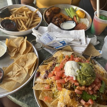 Wet Willie's - Nachos, chicken wings, chips and queso, French fries - Lounges Near Me - Miami Beach, Florida Wet Willie's - Nachos, chicken wings, chips and queso, French fries - Lounges Near Me - Miami Beach, Florida