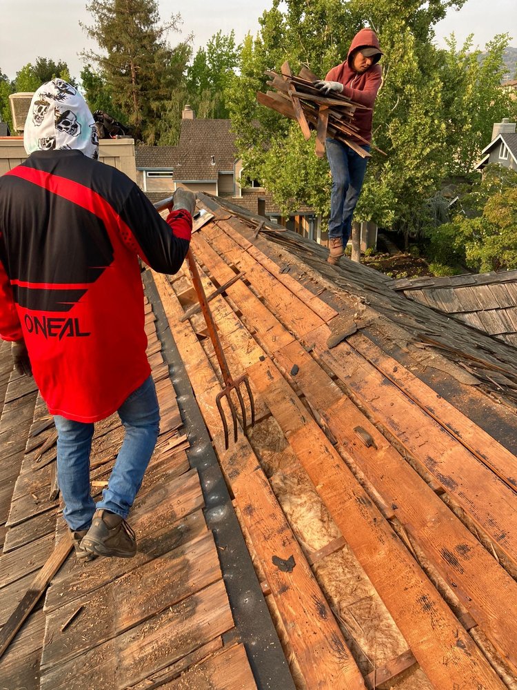 Slide of Green Group Roofing