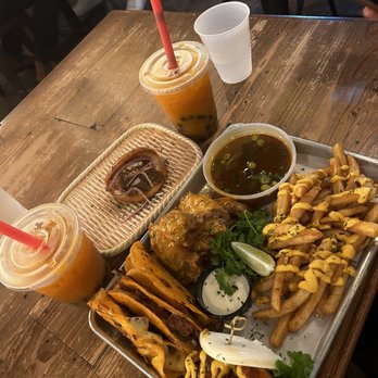 Cris and John - week 4 special. 3 brisket tacos. Fries with yum yum sauce. Barrera bao bun and a spicy chicken bao bun. Wings with the bang bang sauce. - Vietnamese Near Me - Dallas, Texas