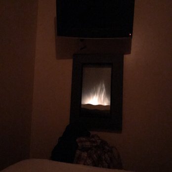 Hotel 1110 - Electric fireplace with flatscreen tv above it - Hotels Near Me - Monterey, California Hotel 1110 - Electric fireplace with flatscreen tv above it - Hotels Near Me - Monterey, California