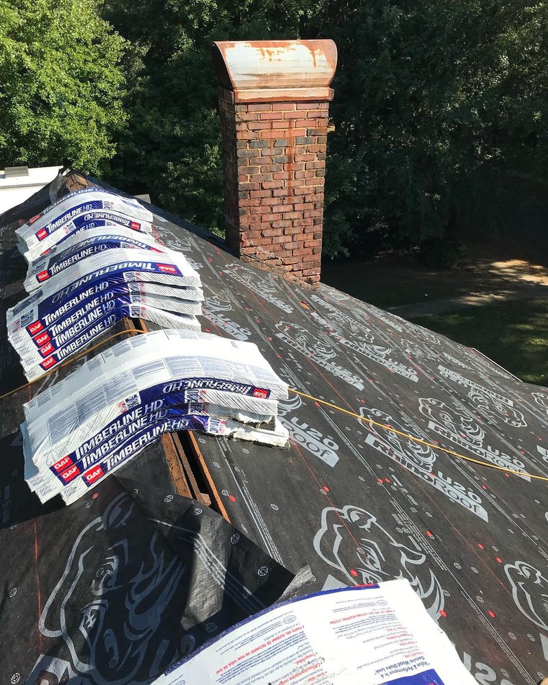 Slide of Absolute Construction & Roofing