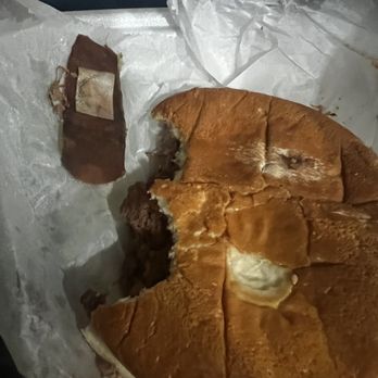 Nicholas Karadasidis - a half eaten sandwich - Pizza Near Me - Philadelphia, Pennsylvania