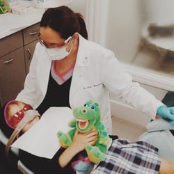 Casa Smiles - Dudley the Dino keeping our patient company!