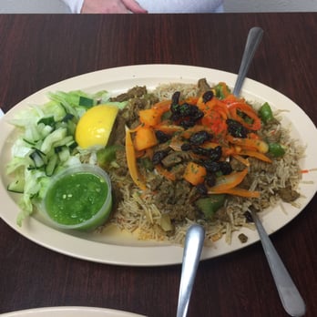 Blue Star Cafe - Beef platter with basmati rice, raisins, side salad and spicy green sauce - Halal Near Me - Milwaukee, Wisconsin Blue Star Cafe - Beef platter with basmati rice, raisins, side salad and spicy green sauce - Halal Near Me - Milwaukee, Wisconsin